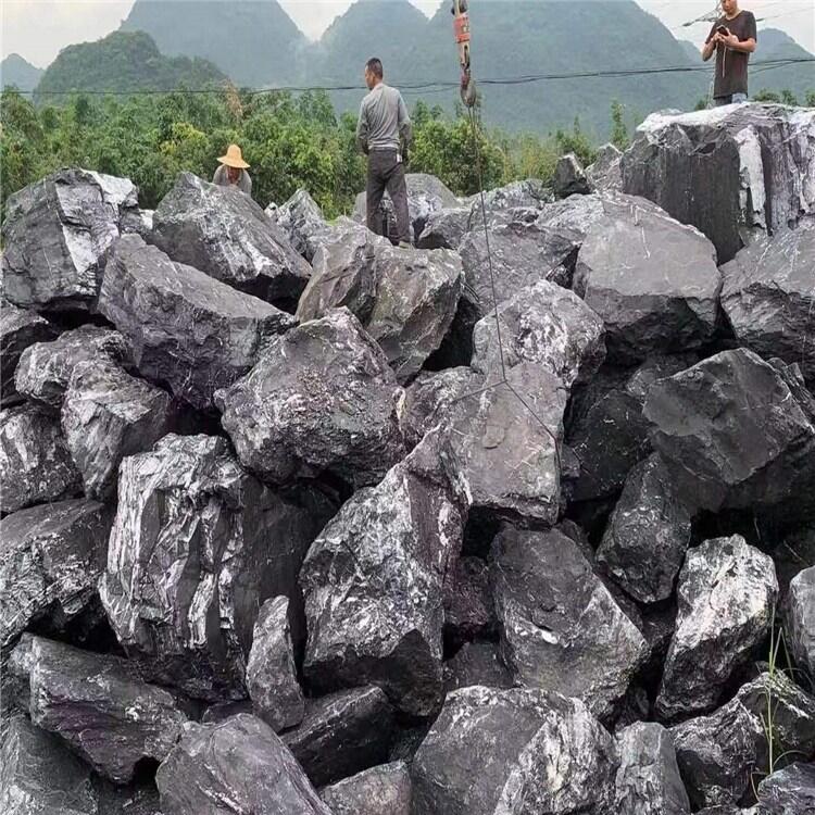 黑山石廠家供應(yīng) 黑山石草坪點(diǎn)綴石假山制作 黑山石價(jià)格