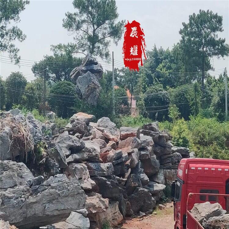 千層石假山池塘效果圖 千層片石假山造型 批發(fā)千層石價格